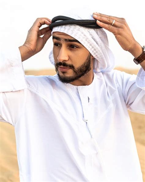 Portrait Of Emirati Style Dressed Young Man In Dubai Desert Men