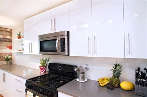 Use rubber gloves and a nylon scourer when cleaning, and follow the instructions on the. Contemporary White High Gloss Foil Kitchen Cabinets ...
