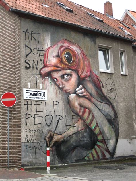 A Painting On The Side Of A Building That Says Art Does Not Say Its