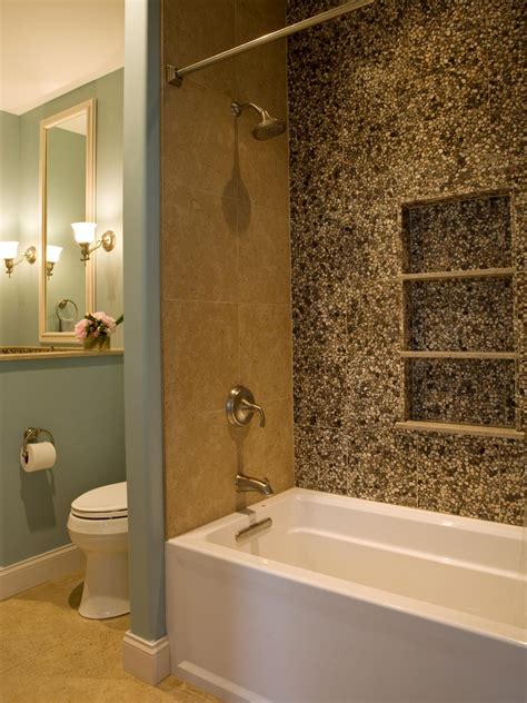 Make a statement with these creative bathroom tile ideas. Transitional Bathroom With Pebble Tile Wall | HGTV