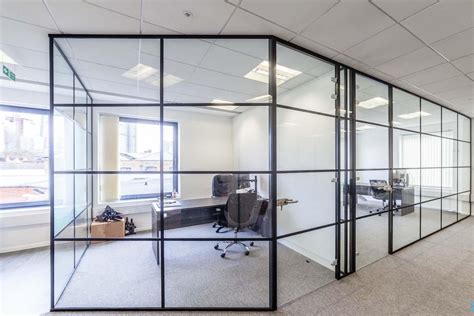 Industrial Style Black Framed Partition Installation Of Glass