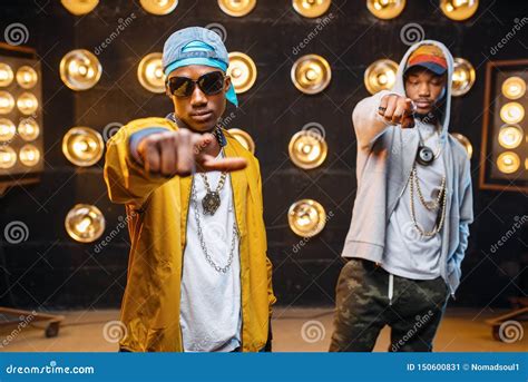 Two Black Rappers In Caps Artists Poses On Stage Stock Image Image