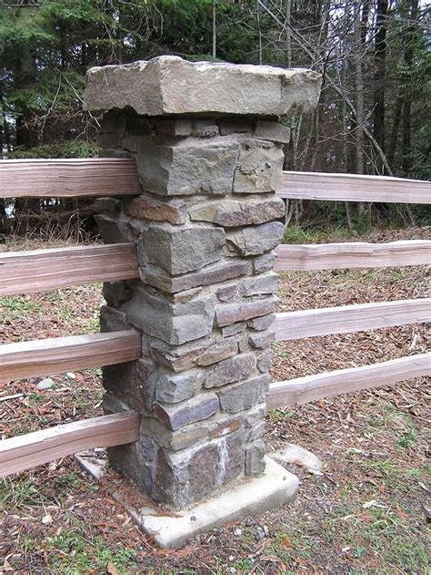 This Stone Column Is Part Of A Split Rail Fence That Travels Along The
