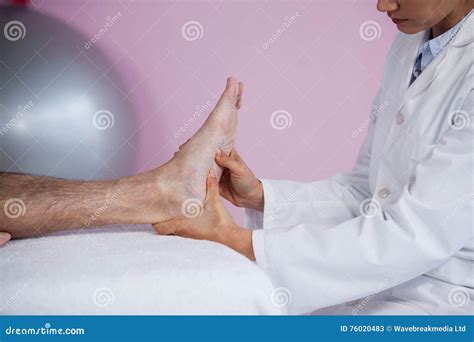 Senior Man Receiving Foot Massage From Physiotherapist Stock Image Image Of Foot Acupressure