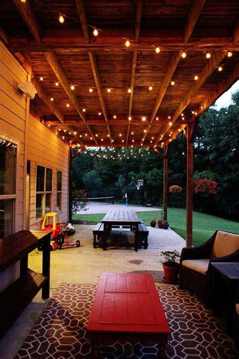 We eat as many of our meals on the porch as we can, but the dinky wall light that was so we picked up a big box of outdoor string lights from costco for $40 to hang above our porch. Pin on Deck