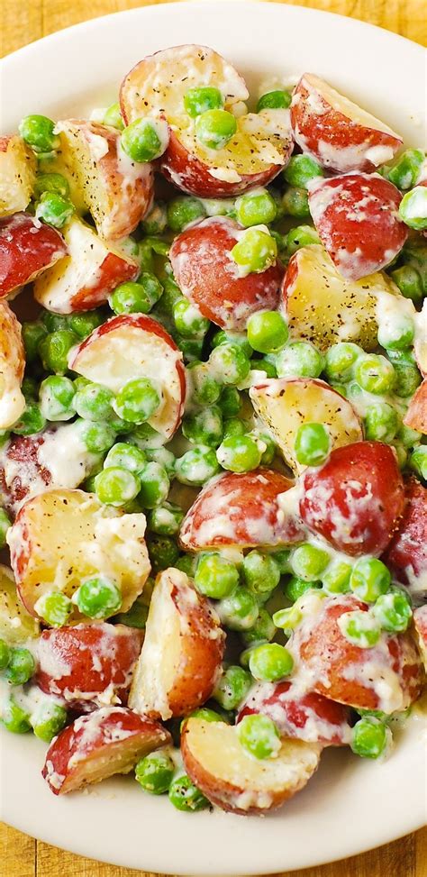 Divide between the dishes and top with chopped potatoes. Creamy Parmesan Garlic Potatoes and Peas - perfect as a ...