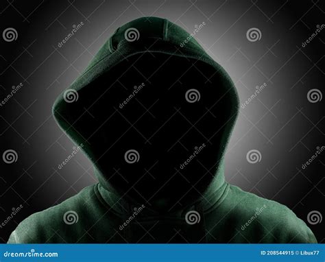 Dark Mysterious Or Faceless Man In A Hoodie Is Hiding His Face Hacker Anonymous Stock Image
