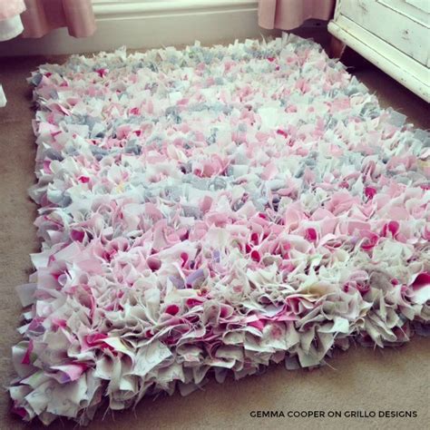 You will be sewing these onto a larger piece of fabric to make a shaggy rug. How To Make A DIY Rag Rug - Using Old Bedding