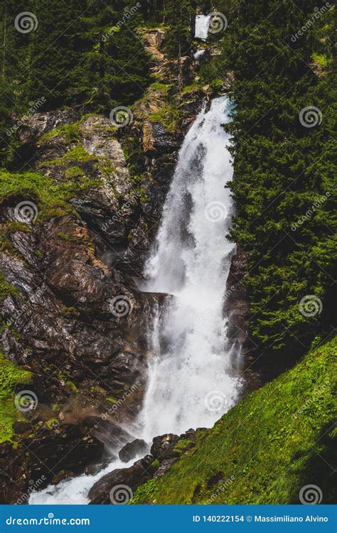 Beautiful Waterfall In A Wood On The Italian Dolomites Stock Photo