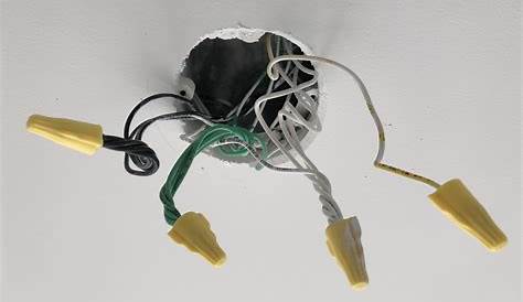 How to wire a light with multiple black/white/green wires from the