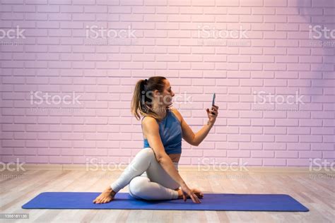 Woman Takes Selfie After Yoga Exercises Stock Photo Download Image