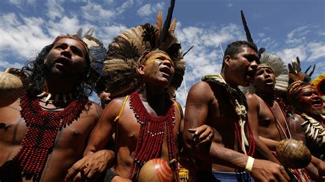 brazil s indigenous people stage protest against loss of rights and land bt