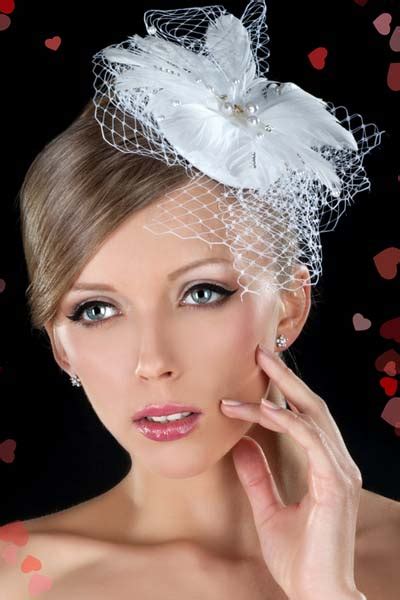 A birdcage veil can be worn any way you'd like: Hairstyles For Women 2015 - Hairstyle Stars