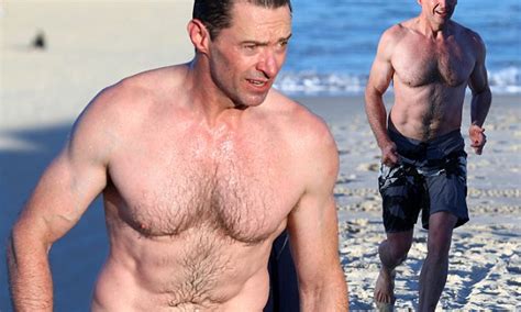 Hugh Jackman 49 Flaunts His Age Defying Ripped Physique As He Emerges From The Sea At Bondi