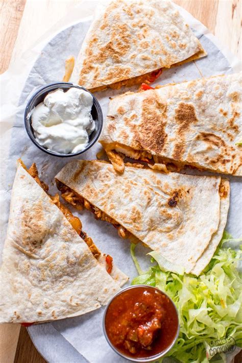 Add 1/4 of a package of taco seasoning. Easy Restaurant-Style Chicken Quesadillas | Recipe in 2020 ...