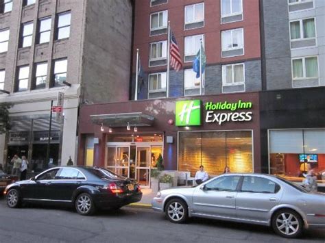 Explore midtown nyc from our times square hotel. Entry to Holiday Inn Express on West 39th st. - Picture of ...