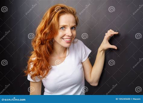 Attractive Woman Making A Gesture With Her Fingers Stock Photo Image