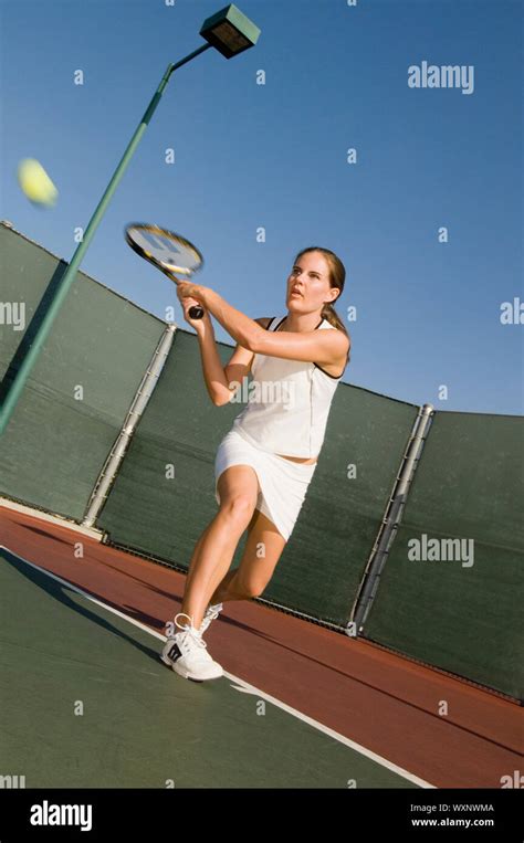 Tennis Player Hitting Backhand Stock Photo Alamy