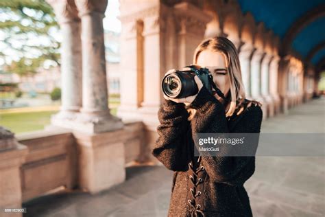 Woman Using Dslr Camera High Res Stock Photo Getty Images