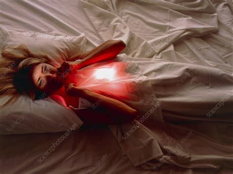 Woman Awake In Bed With Chest Or Abdominal Pain Stock Image M382