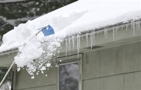 Safely Removing Snow From Your Roof
