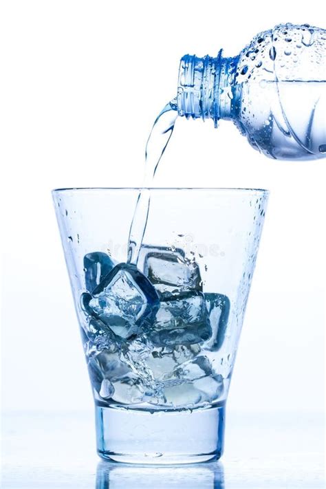 Pouring Water In An Elegant Glass With Ice And Water Drops Stock Image Image Of Beverage