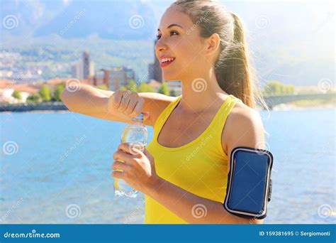 Thirsty Fitness Woman Opens Bottle Of Water After Training Outdoor Fit