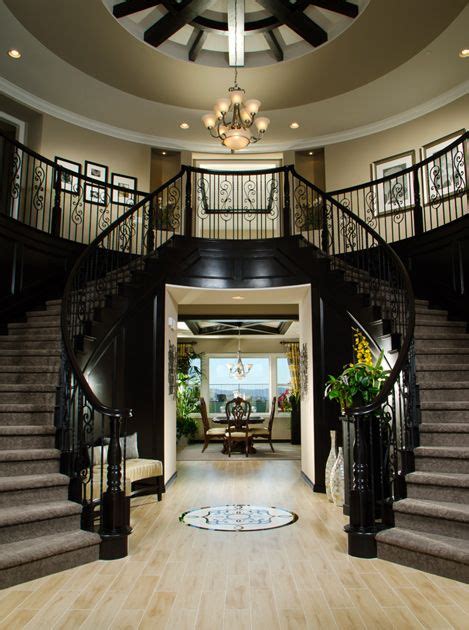 Toll Brothers An Elegant Dual Circular Staircase At The Foyer Greets