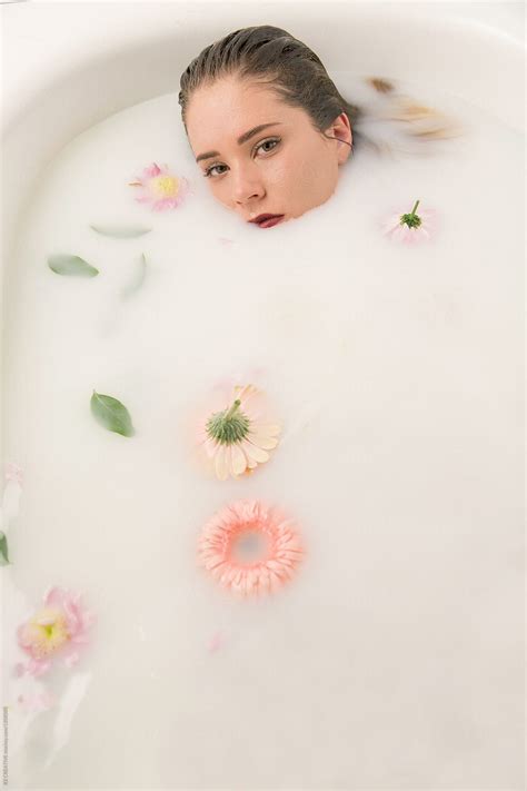 Woman Soaking In A Milk Bath By Rzcreative