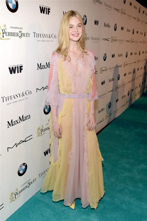 Elle Fanning Braless Wearing A Sexy Dress At The 8th Annual Women In