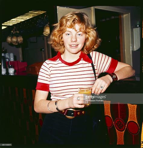swedish actress inger nilsson performer of pippi longstocking posing with a glass of juice in