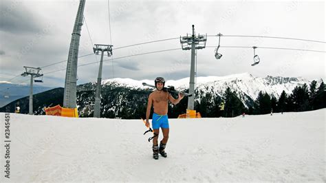 Sexy Naked Gay Holding Skies Pose On Ski Slope Under Ski Lift Smiling Stock Photo Adobe Stock