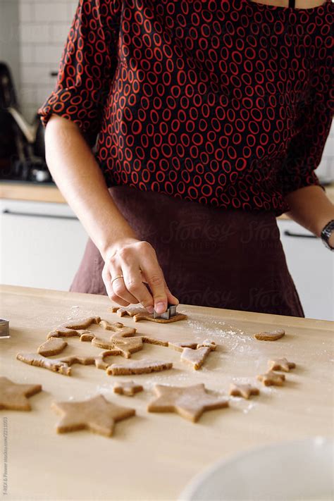 Crop Woman Cutting Gingerbread Cookies By Stocksy Contributor Danil Nevsky Stocksy