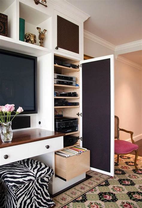 The guest room has a wall of custom cabinets built around the window in designer michaela scherrer's guest bedroom. Built In TV Cabinets with Mesh Metal Grille Doors ...