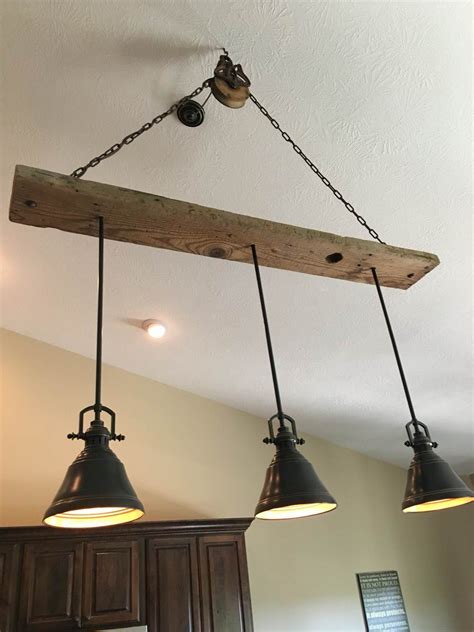 High ceilings like vaulted or cathedral ceilings need several layers of lighting options to adequately light all that extra space. Flexible track Lighting in kitchen with vaulted ceiling ...