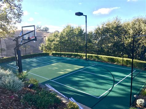 Kids can now safely play basketball in our backyard! Backyard Basketball Courts - Outdoor Residential ...