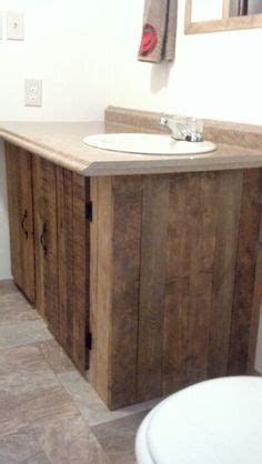If you have a thing for faux drawers, make this your classy faux drawer door vanity decor! I made this Bathroom vanity made from pallet wood. | Pallet bathroom, Diy bathroom vanity ...