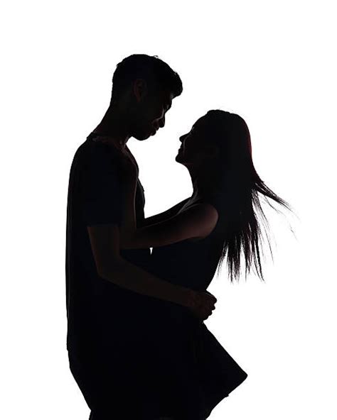 Silhouette Of Two Kissing Lovers Shadow Stock Photos Pictures