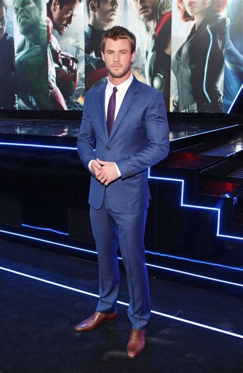 Taller celebrities are reduced to this height. Chris Hemsworth | Blue suit men, Mens outfits