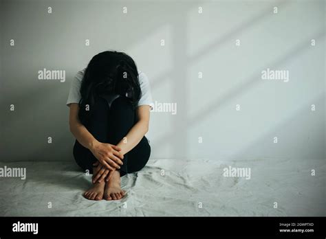 Sad Woman Hug Her Knee And Cry Hi Res Stock Photography And Images Alamy