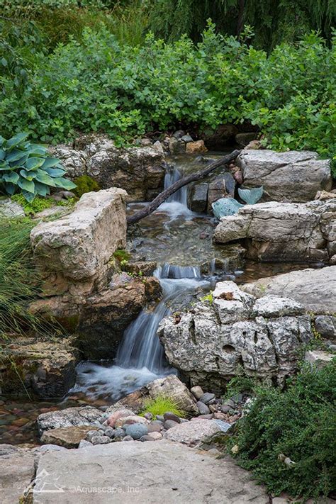 This is how i diy a low cost pondless backyard waterfall. Pondless Waterfall | Design & Build a Low Maintenance ...