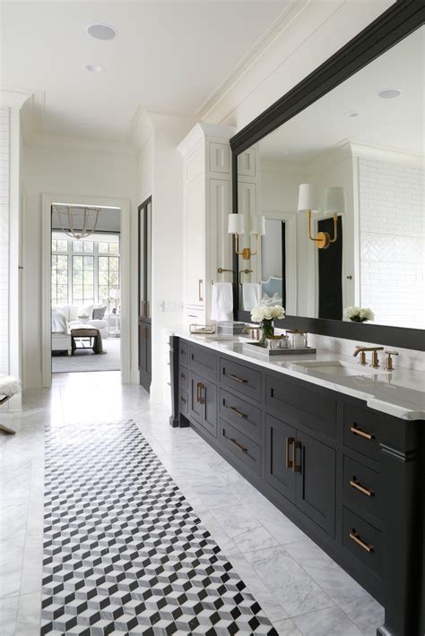 Use this guide to find ideas for bathroom vanities that will perfectly finish your next bathroom upgrade. Traditional Black And White Master Bathroom With Double ...