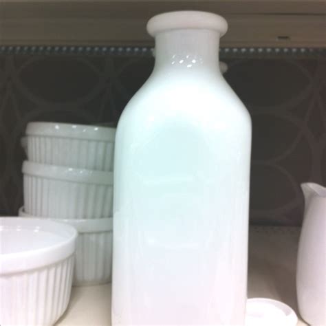 I wanted to give a try to transform the small starbucks jugs into mini milk bottles. White milk bottle | Homegoods Collection | Pinterest