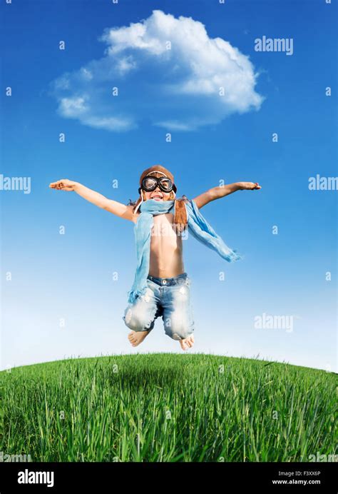 Happy Kid Jumping Outdoors Stock Photo Alamy