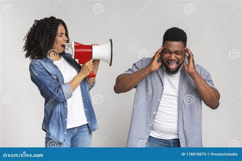 Angry Man Yelling At Woman