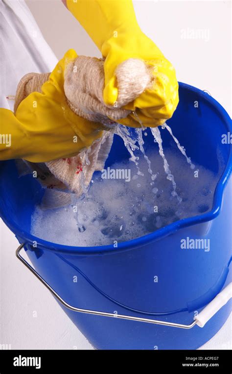 Wringing Out Rag Hi Res Stock Photography And Images Alamy