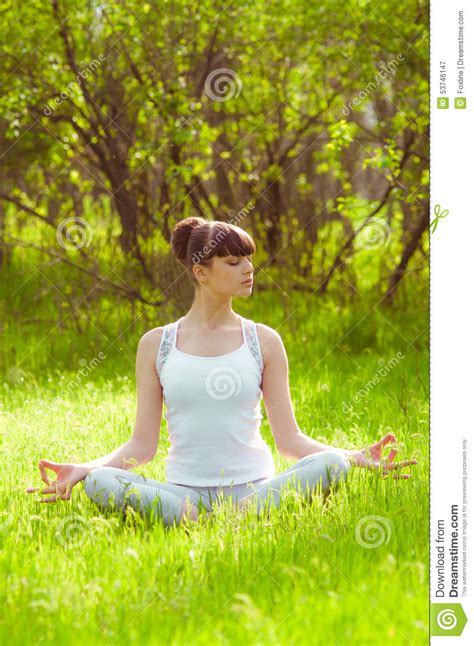 Young Girl Doing Yoga On A Green Grass Stock Image Image Of Health