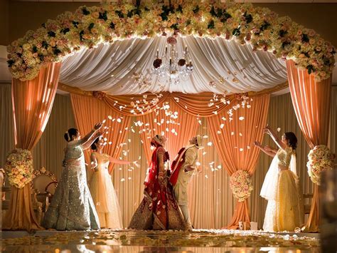 Things To Expect When Attending Your First Indian Wedding Wedding Stage Decorations Indian