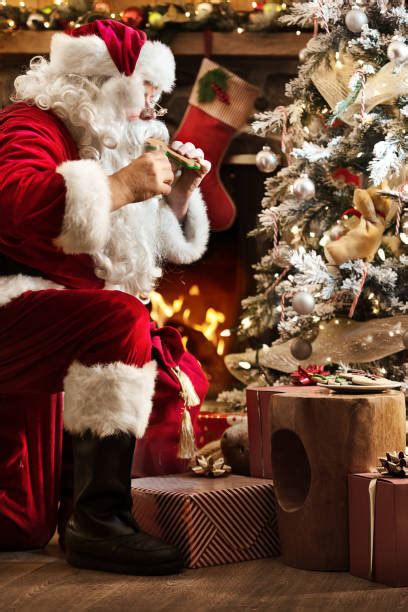 910 Santa Eating Cookies Stock Photos Pictures And Royalty Free Images