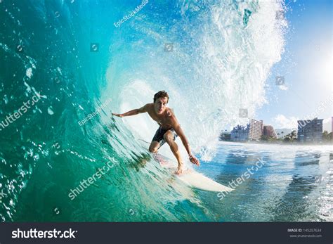Surfer On Blue Ocean Wave Getting Stock Photo 145257634 Shutterstock